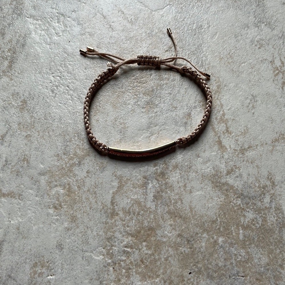 Fossil, adjustable braided bracelet with rose gold accents